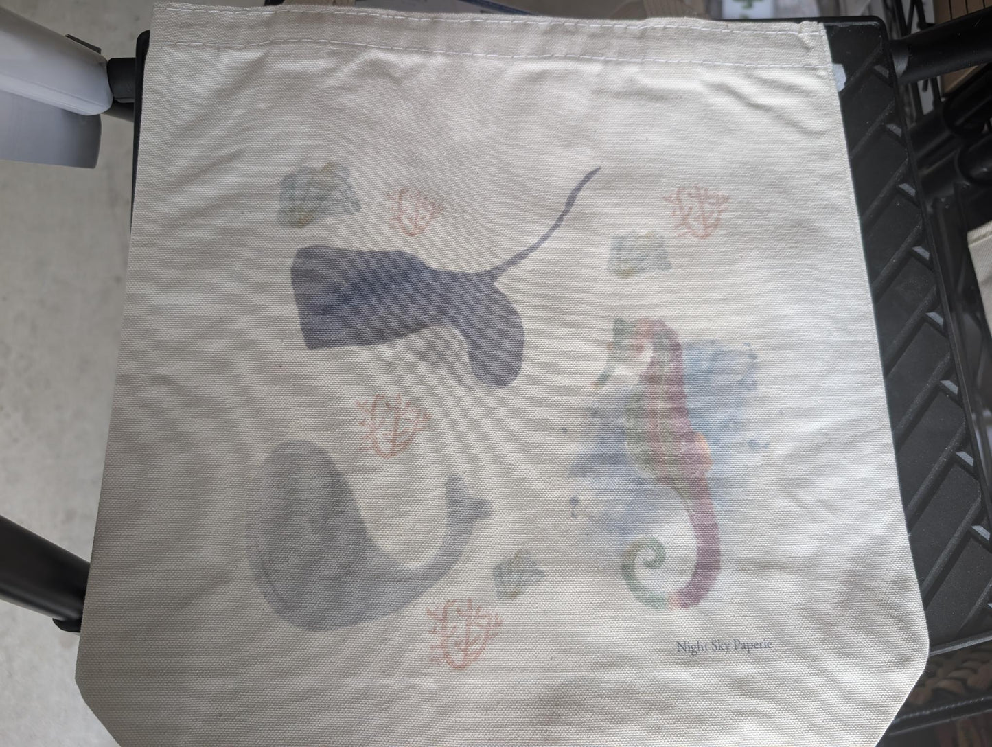 Tote bag with watercolor whale, stingray, sea coral and seahorse designs 